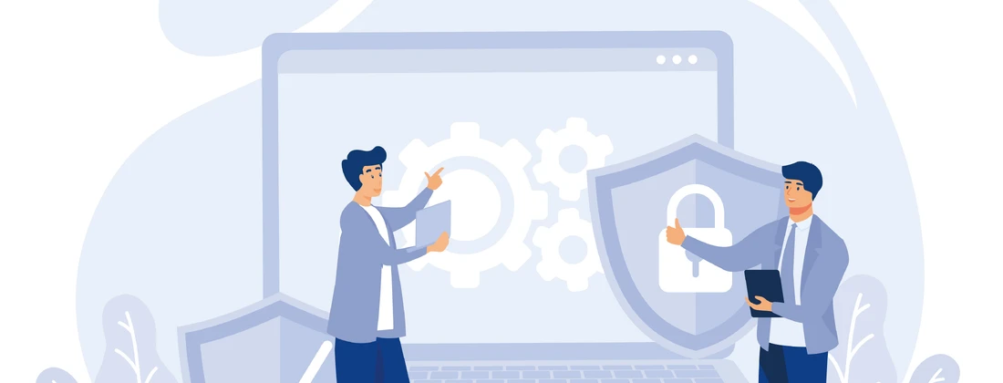 Zwei Personen, die vor einem Laptop stehen, mit einem Schutzschild und Zahnrädern im Hintergrund, symbolisieren IT-Sicherheit.